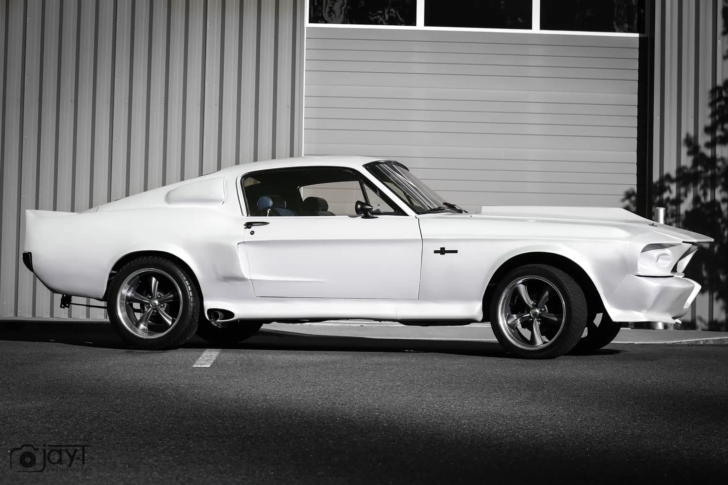 Mustang wrapped in satin white vinyl, the kind of result the wrap visualizer previews